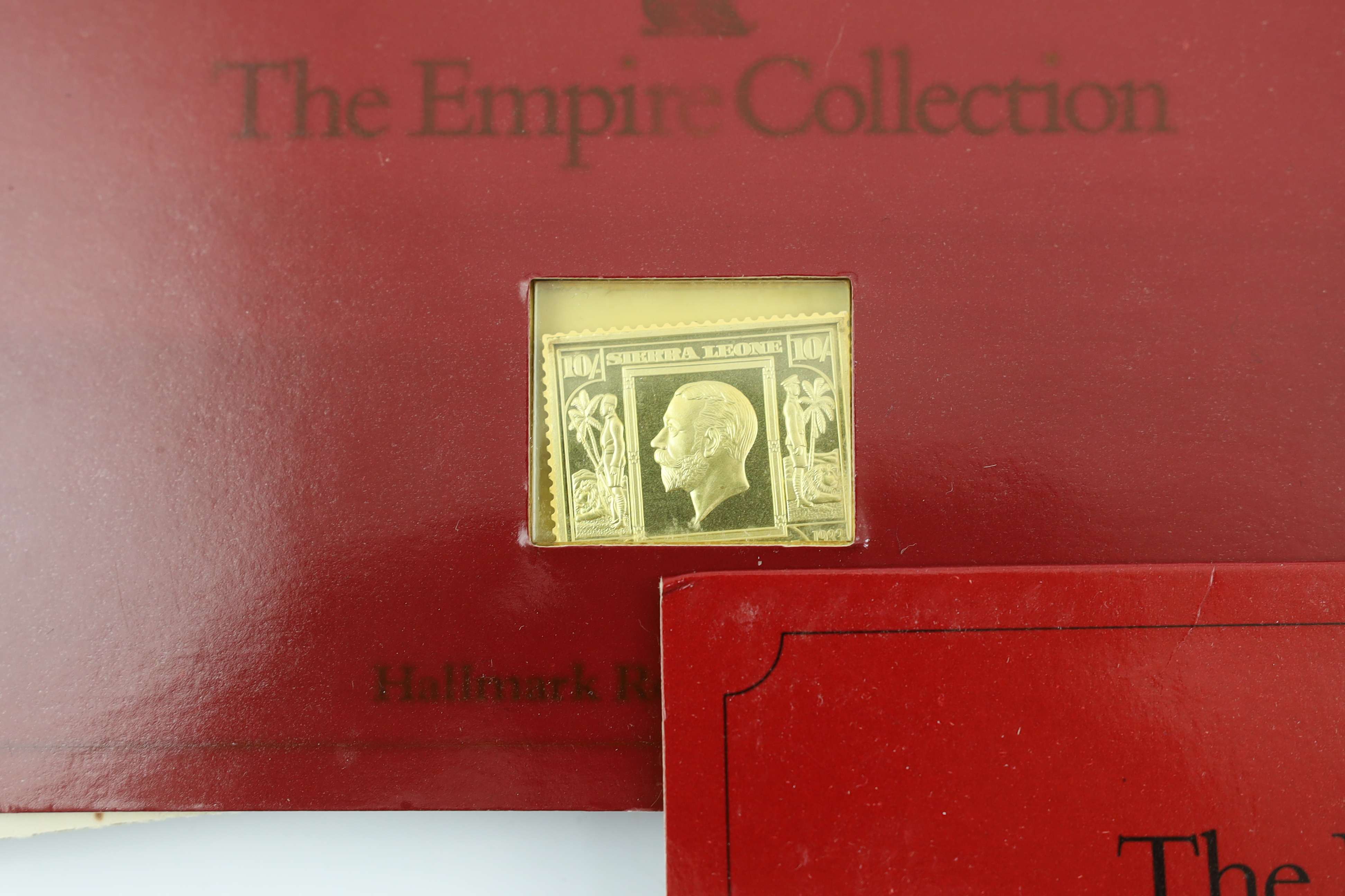 ‘The Empire Collection’, twenty five silver-gilt stamp replica ingots, in individual packets, approx. 471g